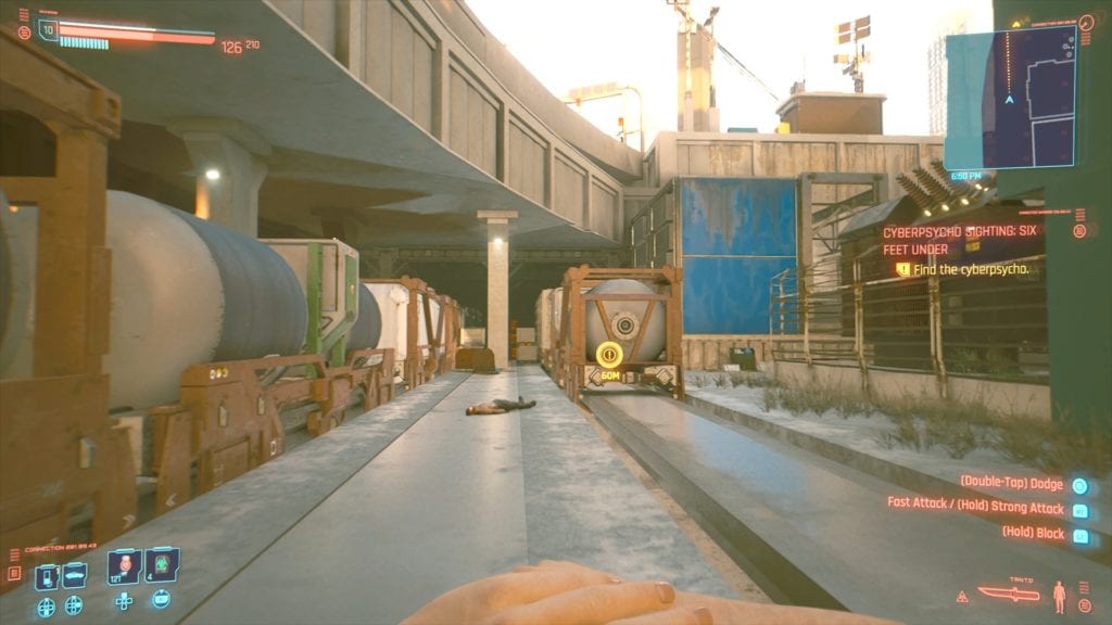 Hide behind the train carts as you go towards the Cyberpsycho for a surprise attack.