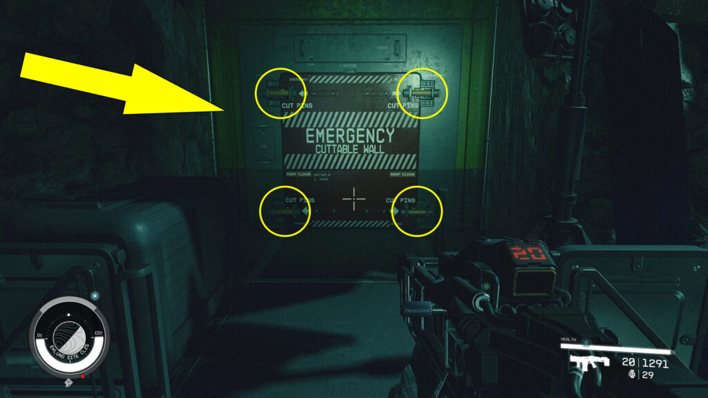 Shoot with any weapon to cut the four pins in each corner of the Emergency Cuttable Wall.