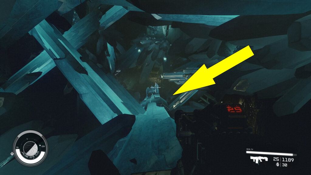 To proceed deeper into the Abandoned Asteroid Mine, walk across the giant crystal and pull the switch in the nearby room to open the door.