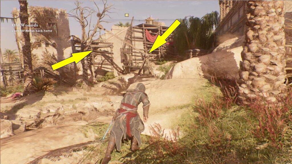 Jump on the crane, then drop on the hanging platform.