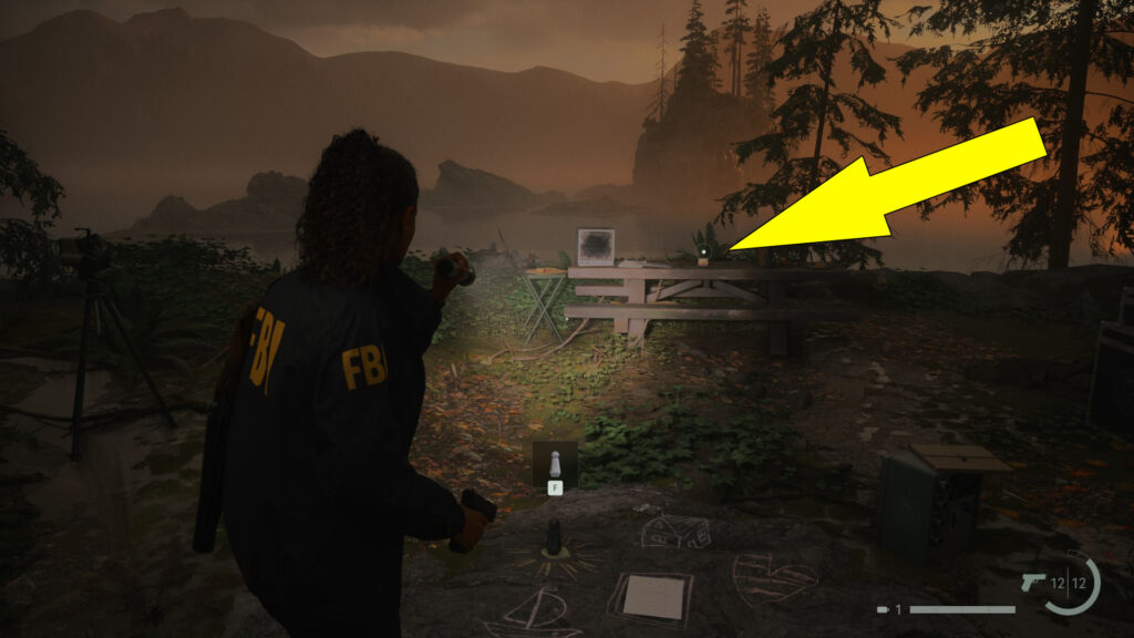 The Hammer Charm can be found on the picnic table.