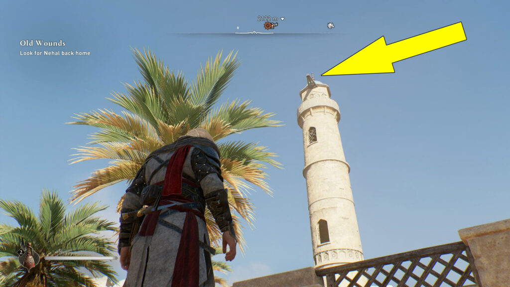 To reach the beam, follow the path of the bricks sticking out of the tower's walls.