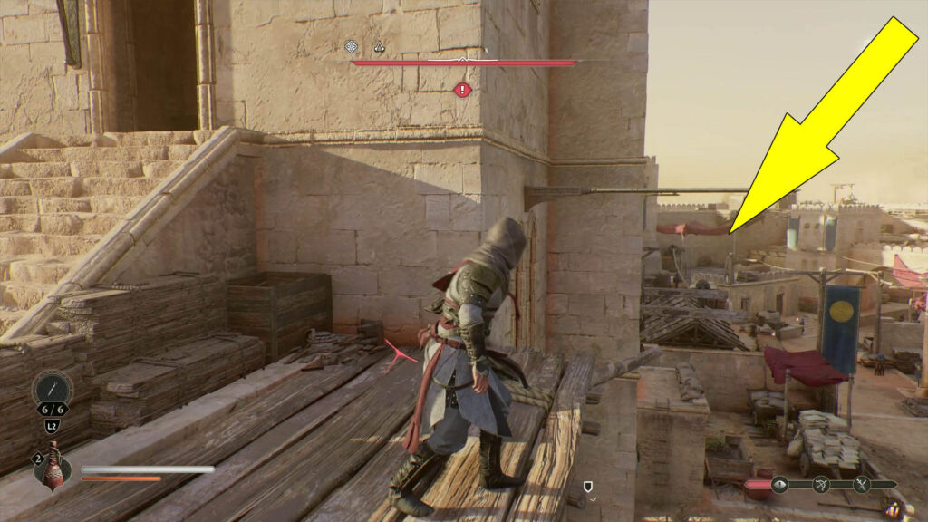 Proceed to the opposite side of the tower by using the poles and beams located on the courtyard side.