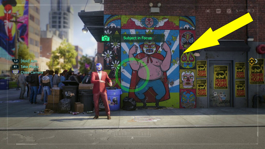 Take a picture of the masked man with striking red suit.