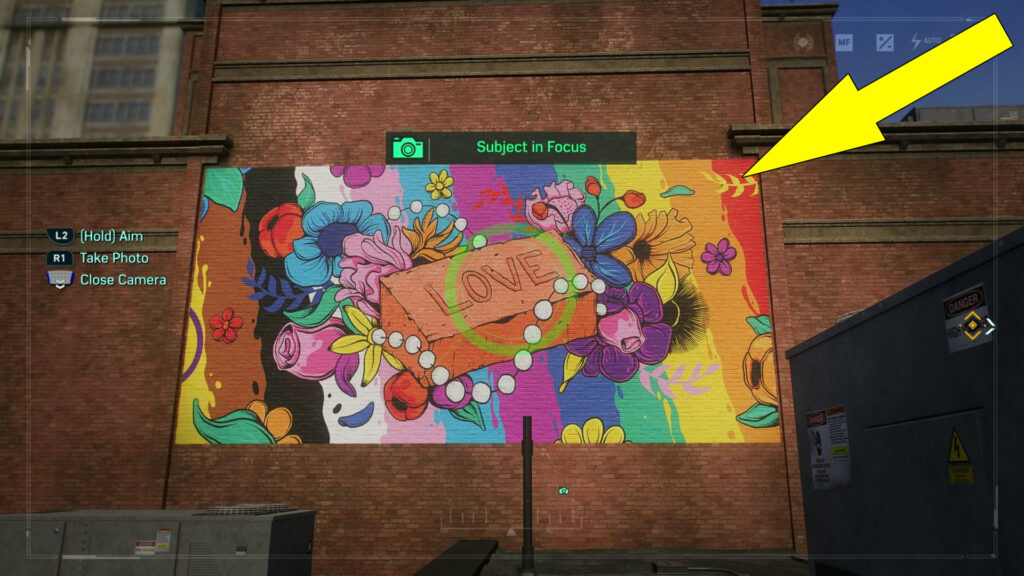 Take a picture of the colorful mural on the brick building in the northern side of Greenwich.
