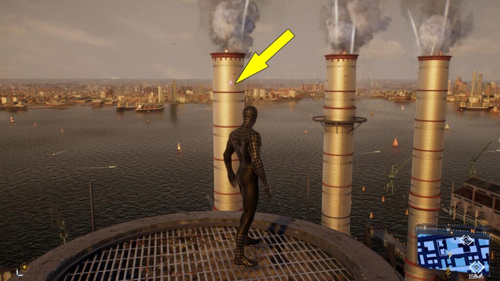 The second Spiderbot collectible is siting on a smoke stack.