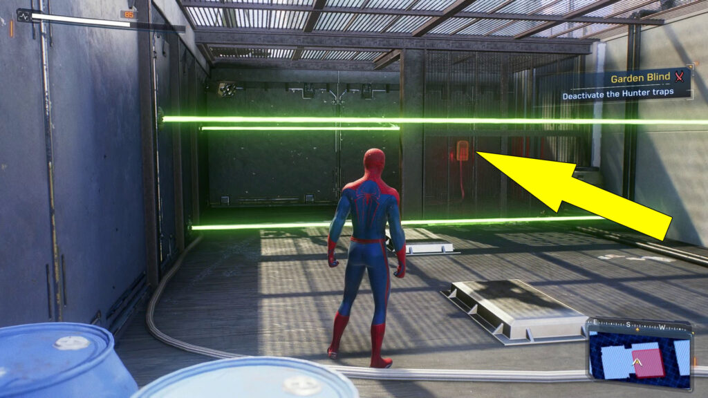 Disable the lasers by pulling the power source in the southeast corner of the roof.