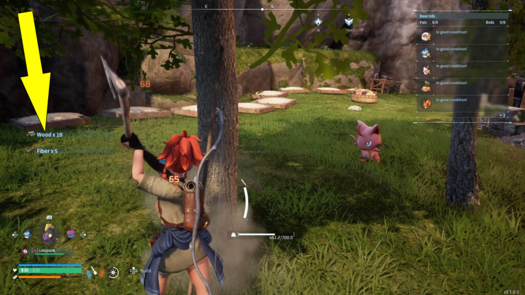 The screenshot shows how to cut trees to obtain Wood and Fiber in Palworld.